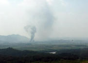 Smoke rises in the North Korean border town of Kaesong, seen from Paju, South Korea, Tuesday, June 16, 2020. South Korea says that North Korea has exploded an inter-Korean liaison office building just north of the tense Korean border. (Yonhap via AP)