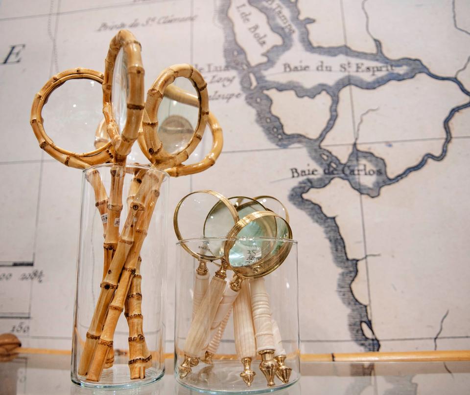 These faux ivory and bamboo magnifying glasses are among the unique finds at KELLER.