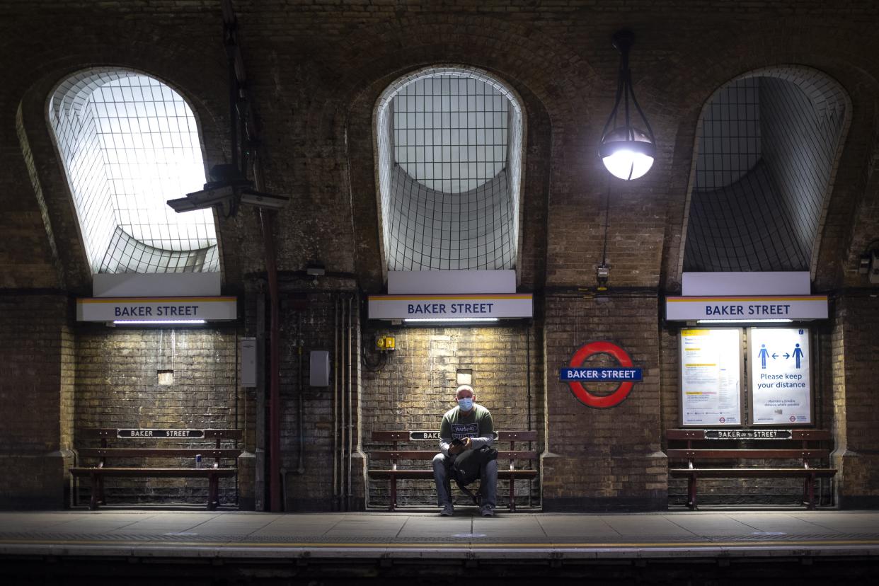 A man wearing a face mask in Baker Street Tube station in London (Victoria Jones/PA) (PA Wire)