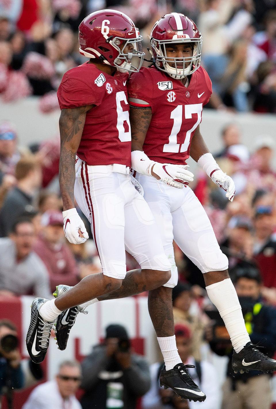 Alabama wide receiver DeVonta Smith (6) and wide receiver Jaylen Waddle (17) celebrate a Smith touchdown against LSU at Bryant-Denny Stadium in Tuscaloosa, Ala., on Saturday November 9, 2019.