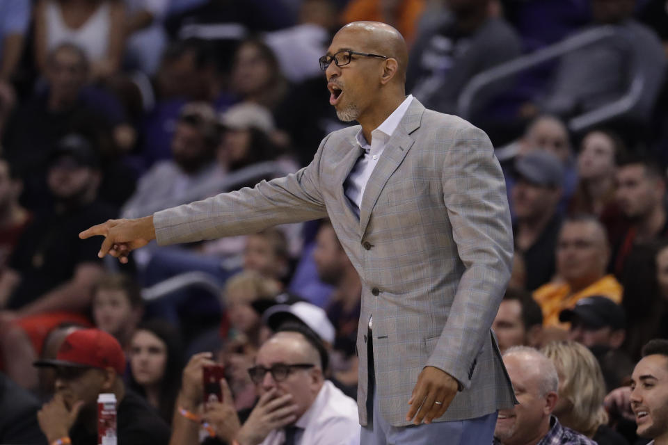 Phoenix Suns head coach Monty Williams instructs his team during the first half of an NBA preseason basketball game against the Denver Nuggets, Monday, Oct. 14, 2019, in Phoenix. (AP Photo/Matt York)