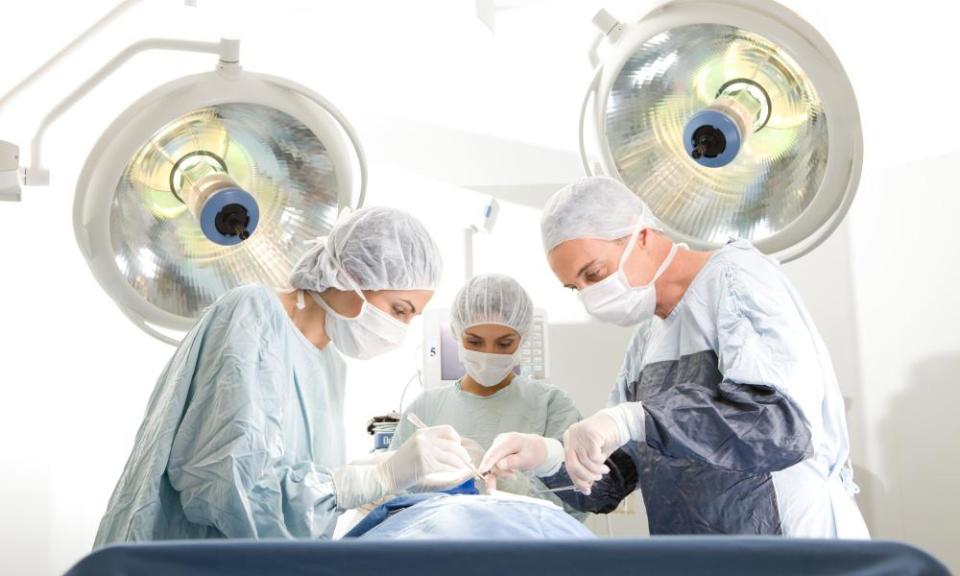 Surgeons operating