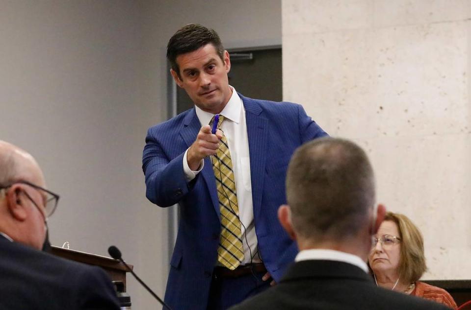 Deputy District Attorney Chris Peurvelle speaks during closing arguments in the Kristin Smart murder trial on Monday, Oct. 3, 2022. Robert Sanger, Paul Flores’ defense attorney, listens as the Flores sits nearby. “He’s guilty as sin!” Peuvrelle said of Flores.