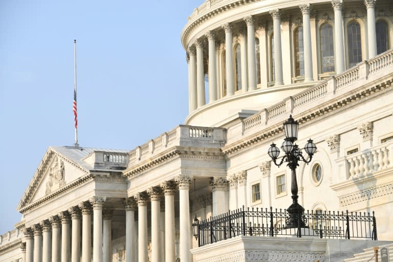 A flag flies at half staff on Capitol Hill in Washington on August 27, 2018 following the death of Senator John McCain