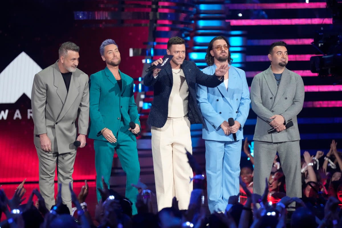 Joey Fatone, from left, Lance Bass, Justin Timberlake, JC Chasez and Chris Kirkpatrick of NSYNC present the award for best pop during the MTV Video Music Awards (Charles Sykes/Invision/AP) (AP)