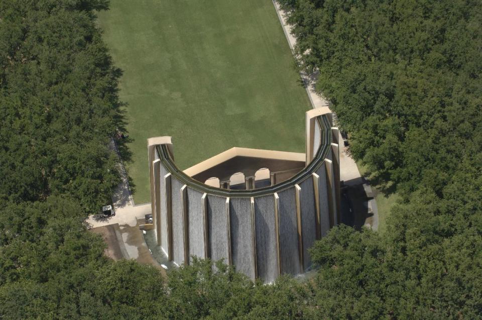 This undated photo provided by the Greater Houston Convention and Visitors Bureau shows the Water Wall, a 64-foot curved, black obsidian wall that recirculates 11,000 gallons of water each minute. It's one of Houston's most photographed sites and one of the city's best free attractions. (AP Photo/Greater Houston Convention and Visitors Bureau)