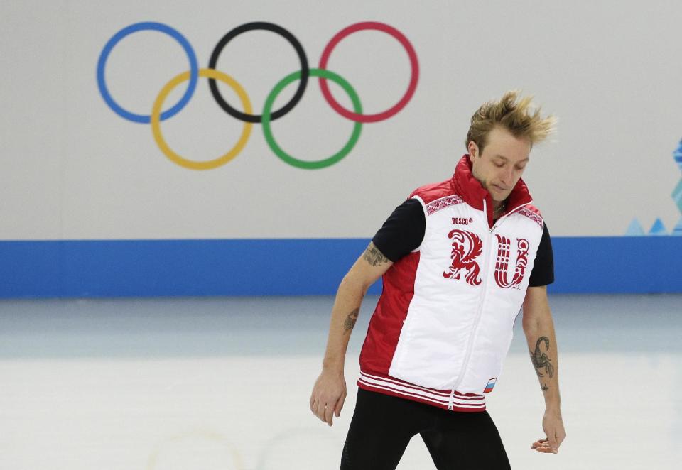 Evgeni Plushenko of Russia warms up before a men's figure skating training session at the Iceberg Skating Palace ahead of the 2014 Winter Olympics, Wednesday, Feb. 5, 2014, in Sochi, Russia. (AP Photo/Bernat Armangue)