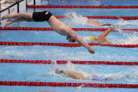 Britain's Duncan Scott dives in for the final leg of the men's 4x200-meter relay at the 2020 Summer Olympics, Wednesday, July 28, 2021, in Tokyo, Japan. (AP Photo/Charlie Riedel)