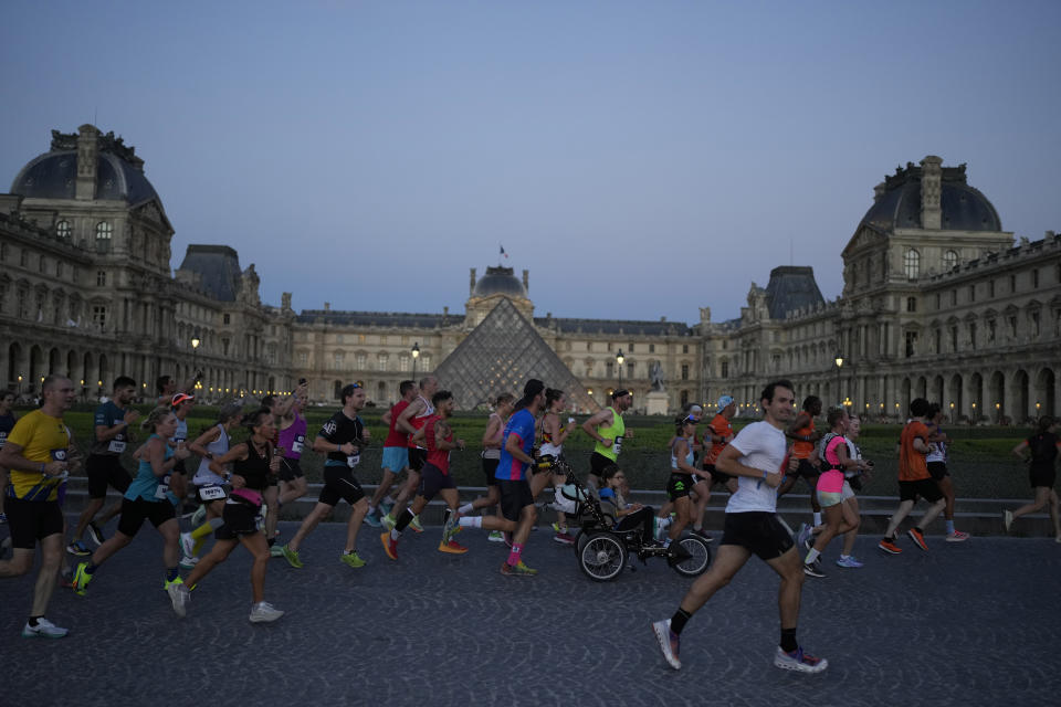 Amateur runners race like Olympians along the same iconic route as