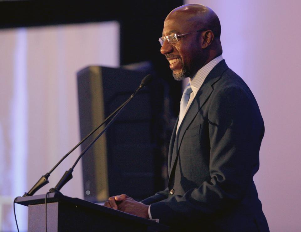 Sen. Raphael Warnock, D-Ga.,  addresses the Gwinnett County Democratic Party fundraiser on Saturday, May 21, 2022 in Norcross, Ga.