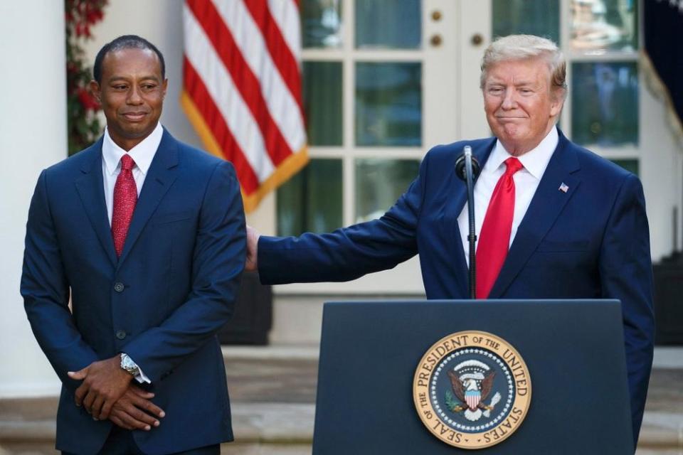 Donald Trump and Tiger Woods | SHAWN THEW/EPA-EFE/Shutterstock