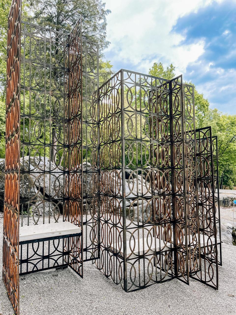 "Graft Knoxville," a new landmark sculpture at the University of Tennessee/GATOP Arboretum & Education Center. May 6, 2022. The sculpture consists of three interrelated Corten steel bench sections and includes three polished white marble benches.