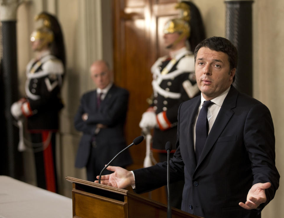 Italian Democratic Party's leader Matteo Renzi talks to journalists at the Quirinale presidential palace after talks with Italan President Giorgio Napolitano, in Rome, Monday, Feb. 17, 2014. Renzi was asked to form a new government to replace the one he sacked through a stunning power-grab within his own party. Renzi drove himself to his meeting with Napolitano, mimicking the down-to-earth approach of his predecessor, Enrico Letta.(AP Photo/Alessandra Tarantino)