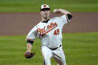 Baltimore Orioles starting pitcher Keegan Akin throws a pitch to the Atlanta Braves during the first inning of a baseball game, Wednesday, Sept. 16, 2020, in Baltimore. (AP Photo/Julio Cortez)