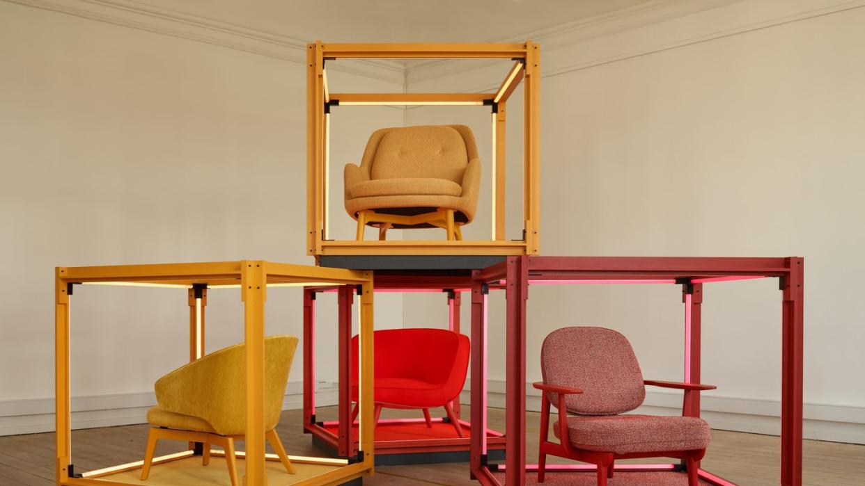 two red chairs and two yellow chairs in corresponding red and yellow boxes