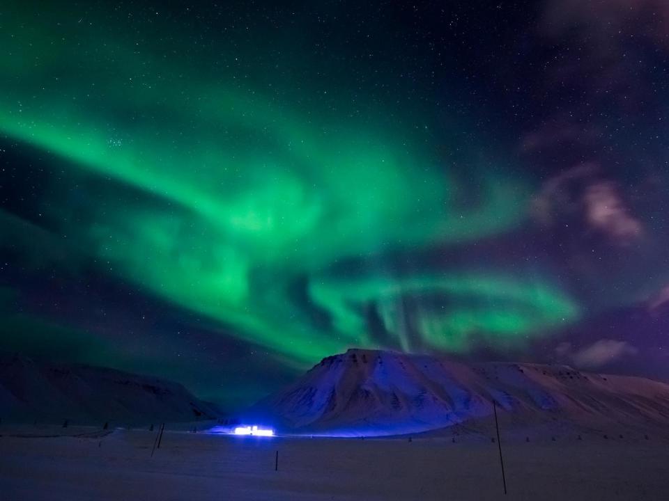 Dark winter in Svalbard offers great conditions for seeing the Northern Lights: Shutterstock