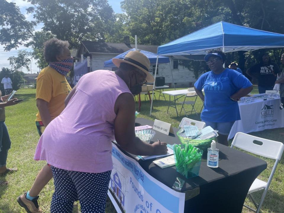 Community members come to Pounds of Care's A Community Thrives launch party.