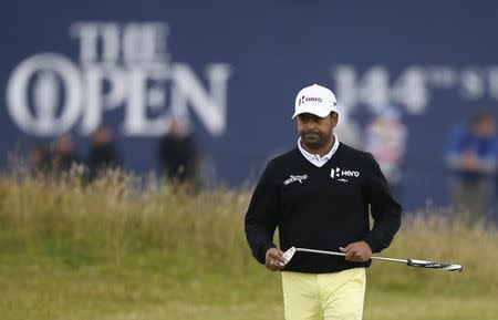 Anirban Lahiri of India walks on the first green during the third round of the British Open golf championship on the Old Course in St. Andrews, Scotland, July 19, 2015. REUTERS/Russell Cheyne