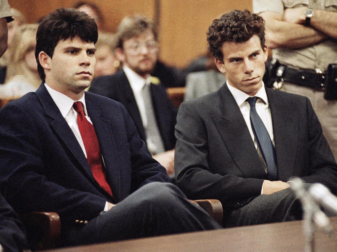 Lyle, left, and Erik Menendez sit in Beverly Hills Municipal Court where their attorneys delayed making pleas on behalf of the brothers who are suspected in the murders of their millionaire parents, Jose and Mary Louise “Kitty” Menendez, in Beverly Hills, Calif., last Aug., March 12, 1990. The arraignment for the brothers has been scheduled for March 26. (AP Photo/Nick Ut)