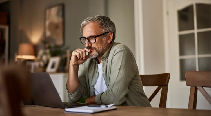 A retired business owner looks over his assets as he considers how to structure his withdrawals. 