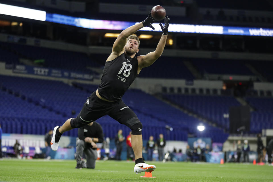 South Florida tight end Mitchell Wilcox runs a drill at the NFL football scouting combine. (AP Photo/Michael Conroy)