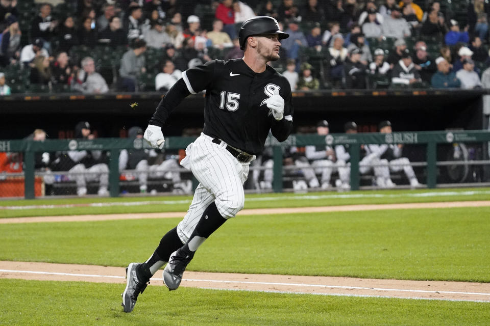 Chicago White Sox's Adam Engel runs to first after hitting a single during the third inning of the team's baseball game against the Detroit Tigers in Chicago, Friday, Sept. 23, 2022. (AP Photo/Nam Y. Huh)