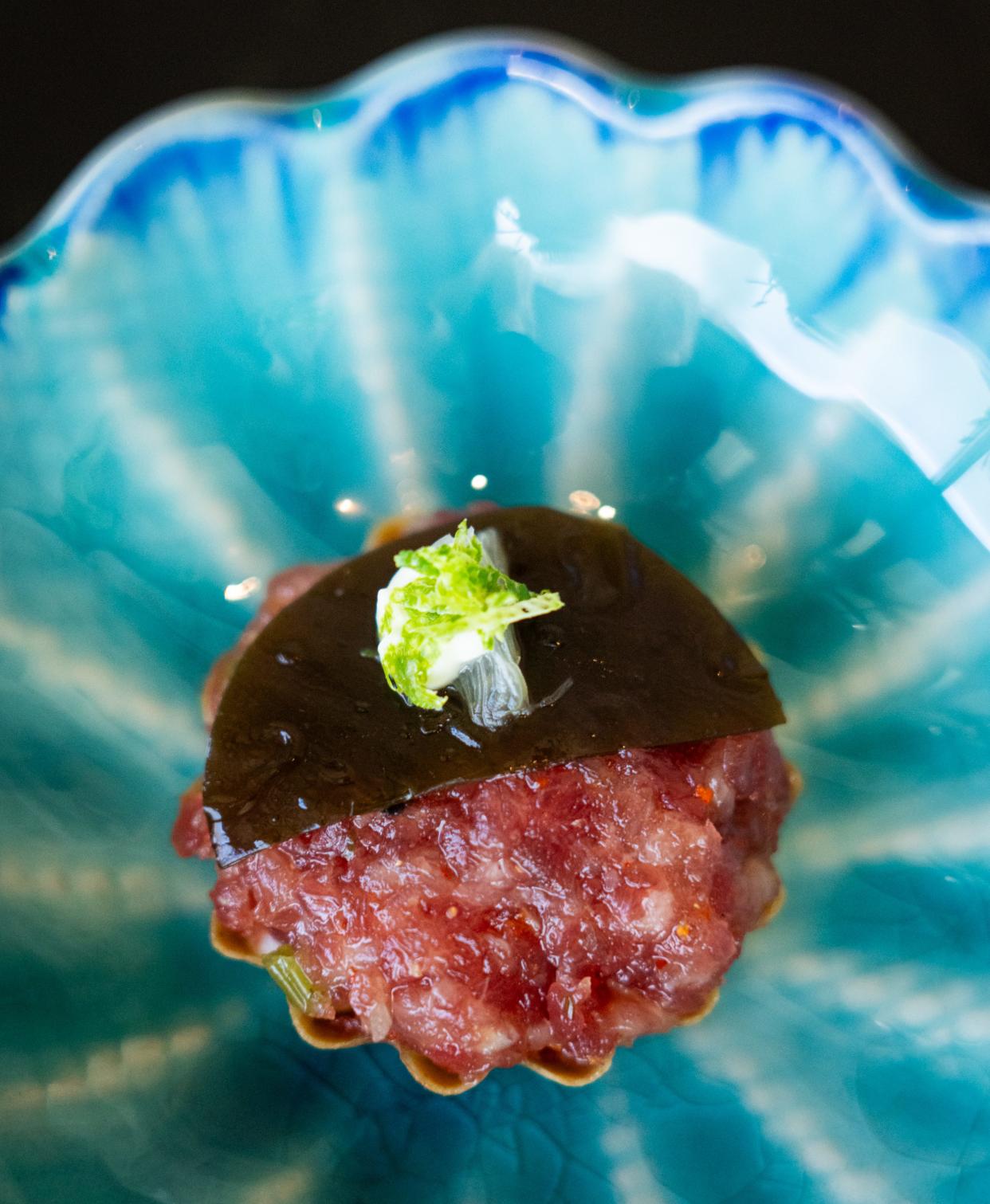 A fine chop of bluefin tartare sits in a nori tart at Craft Omakase.