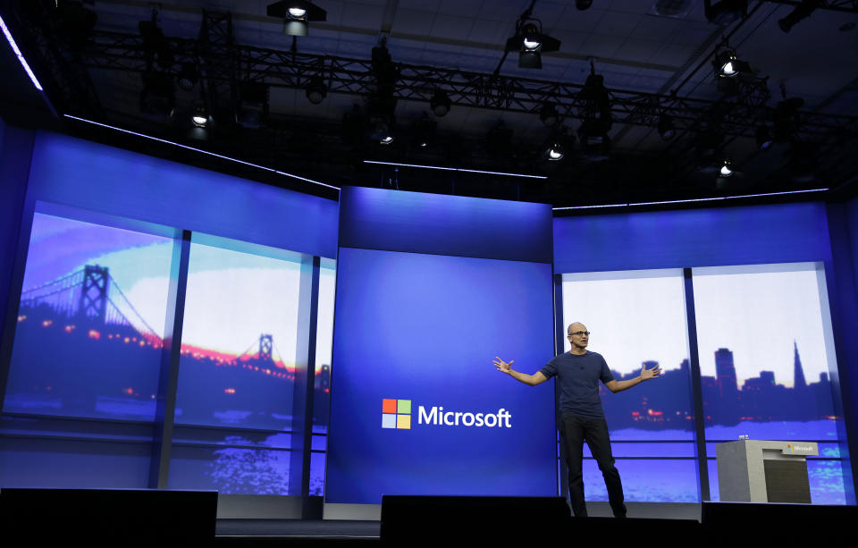 Microsoft CEO Satya Nadella gestures during the keynote address of the Build Conference Wednesday, April 2, 2014, in San Francisco. Microsoft kicked off its annual conference for software developers, with new updates to the Windows 8 operating system and upcoming features for Windows Phone and Xbox. (AP Photo/Eric Risberg)