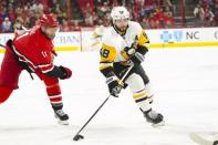 Mar 19, 2019; Raleigh, NC, USA; Pittsburgh Penguins defenseman Kris Letang (58) skates with the puck against the Carolina Hurricanes at PNC Arena. Mandatory Credit: James Guillory-USA TODAY Sports