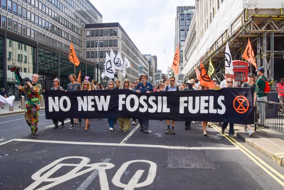 London, UK. 16th Sep, 2023. Protesters hold a 'No new fossil fuels' banner during the protest outside the Department for Energy Security and Net Zero. Extinction Rebellion activists marched through Westminster in protest against new fossil fuels. (Photo by Vuk Valcic/SOPA Images/Sipa USA) Credit: Sipa US/Alamy Live News