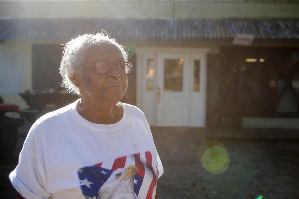 Annie Johnson poses in front of Project Annie's as her and volunteers prepare the Thanksgiving meal Wednesday, Nov. 21, 2018. 