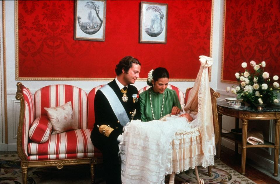 <p>King Carl XVI Gustaf and Queen Silvia gaze at Crown Princess Victoria in the Royal Palace. The royals welcomed their first child on July 14, 1977.</p>