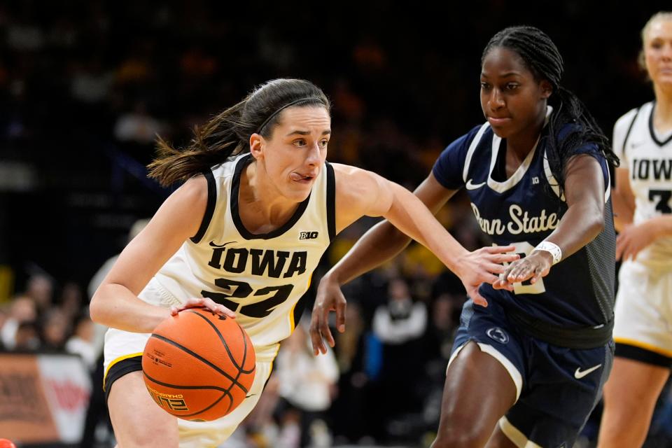 Iowa's Caitlin Clark drives to the basket during the game against Penn State.