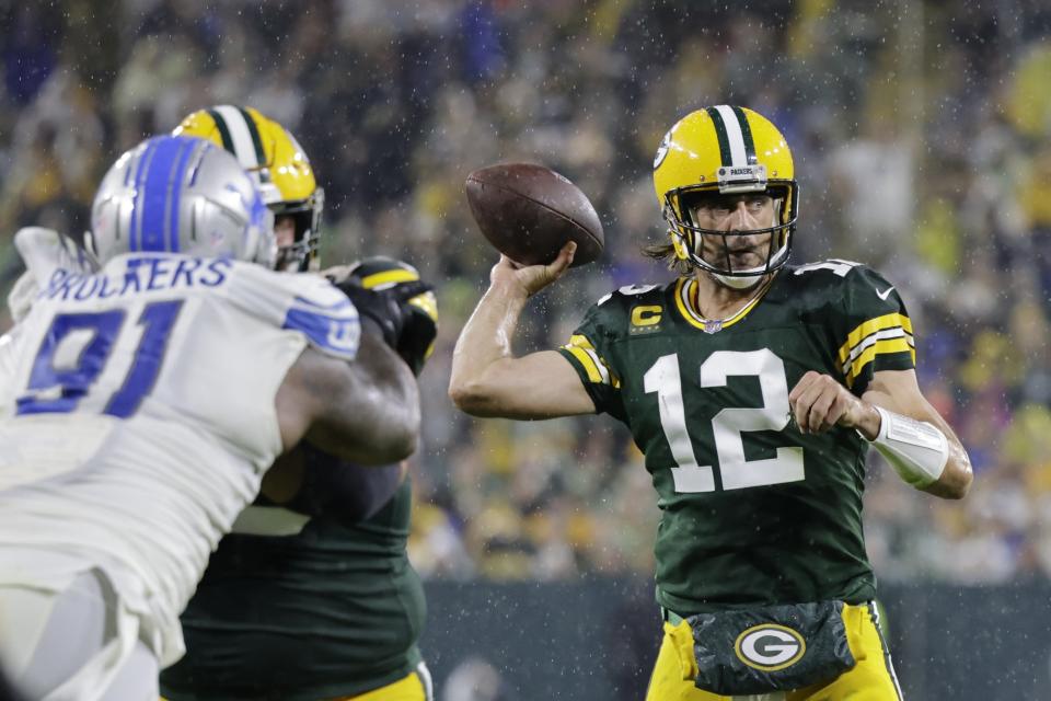 Green Bay Packers' Aaron Rodgers throws during the second half of an NFL football game against the Detroit Lions Monday, Sept. 20, 2021, in Green Bay, Wis. (AP Photo/Mike Roemer)