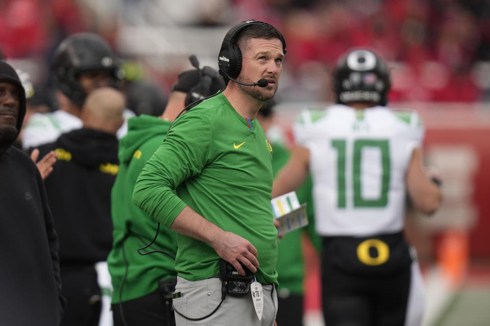 Oregon head coach Dan Lanning looks on during the first half of an NCAA college football game against Utah Saturday, Oct. 28, 2023, in Salt Lake City. (AP Photo/Rick Bowmer)