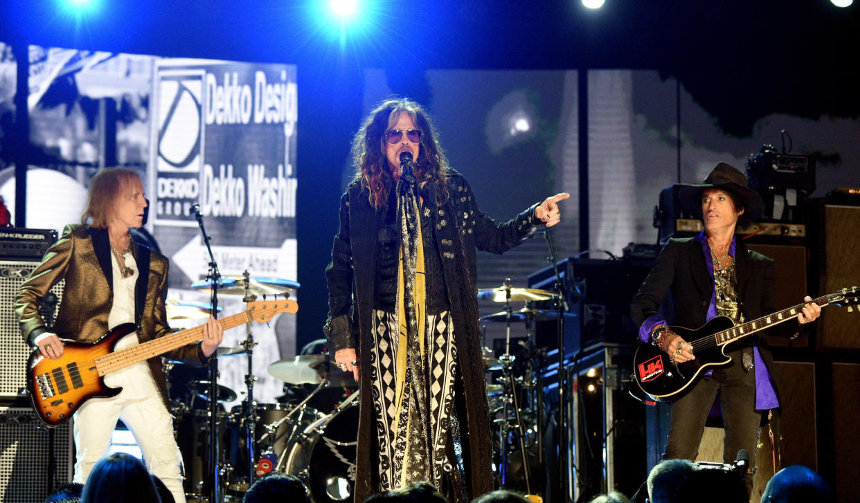  (from left) Tom Hamilton, Steven Tyler and Joe Perry perform onstage with Aerosmith at the 62nd Annual Grammy Awards at the Staples Center in Los Angeles, California on January 26, 2020 