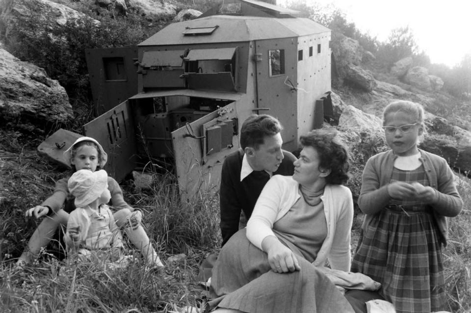 Caption for this photo from LIFE. "Dolly, friend from France who found a fruitful life in Israel." The girl at third from left in the sandbox photo, then Dolly Citroen, she is shown above with her husband, Shmuel Shoshan, and three of their four kids, on a picnic outside Jerusalem. (Paul Schutzer—Time & Life Pictures/Getty Images) <br> <br> <a href="http://life.time.com/history/anne-frank-photographs-of-her-friends/#1" rel="nofollow noopener" target="_blank" data-ylk="slk:Click here;elm:context_link;itc:0;sec:content-canvas" class="link ">Click here</a> to see the full collection at LIFE.com