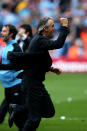 MANCHESTER, ENGLAND - MAY 13: Roberto Mancini the manager of Manchester City celebrates winning the title as the final whistle blows during the Barclays Premier League match between Manchester City and Queens Park Rangers at the Etihad Stadium on May 13, 2012 in Manchester, England. (Photo by Alex Livesey/Getty Images)