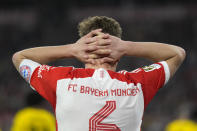 Bayern's Joshua Kimmich reacts during the German Bundesliga soccer match between FC Bayern Munich and Borussia Dortmund at the Allianz Arena stadium, in Munich, Germany, Saturday, March 30, 2024. (AP Photo/Matthias Schrader)