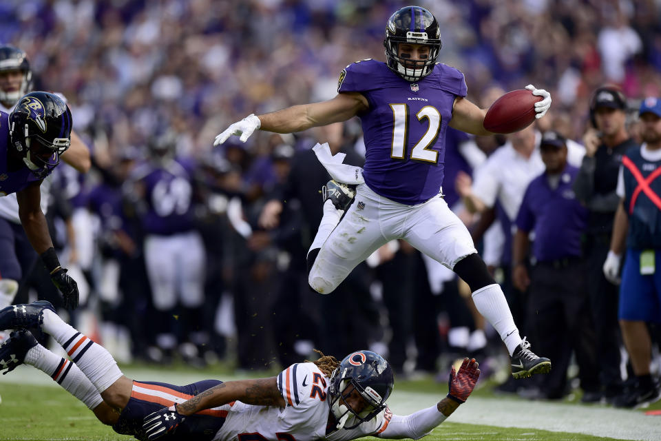 <p>Wide Receiver Michael Campanaro #12 of the Baltimore Ravens returns a punt for a touchdown in the fourth quarter against the Chicago Bears at M&T Bank Stadium on October 15, 2017 in Baltimore, Maryland. (Photo by Patrick McDermott/Getty Images) </p>