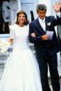 <p>In the closest thing to a royal wedding for Americans, Caroline Kennedy, the only daughter of the late John F. Kennedy, <a href="http://www.townandcountrymag.com/the-scene/weddings/g10330712/caroline-kennedy-wedding/" rel="nofollow noopener" target="_blank" data-ylk="slk:married Edwin Schlossberg;elm:context_link;itc:0;sec:content-canvas" class="link ">married Edwin Schlossberg</a> on June 19, 1986. Kennedy wore a silk gown designed by Carolina Herrera, and the couple married in a Catholic ceremony in Cape Cod. They have three children: Rose, Tatiana, and John. </p>