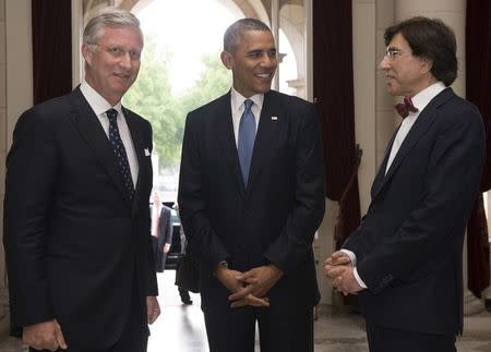 U.S. President Barack Obama attends a meeting with Belgian King Philippe (L) and Belgium's Prime Minister Elio Di Rupo (R) at the Royal Palace ahead of a G7 summit in Brussels June 4, 2014. REUTERS/Benoit Doppagne/Chancellerie du Premier- Kanselarij Van de Premier/Pool