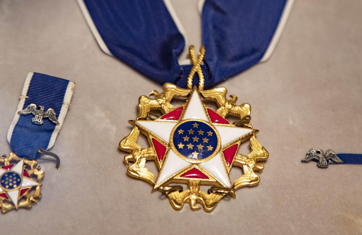 The late Sen. John McCain and former Rep. Gabrielle Giffords are among the 17 recipients of the 2022 Presidential Medal of Freedom.