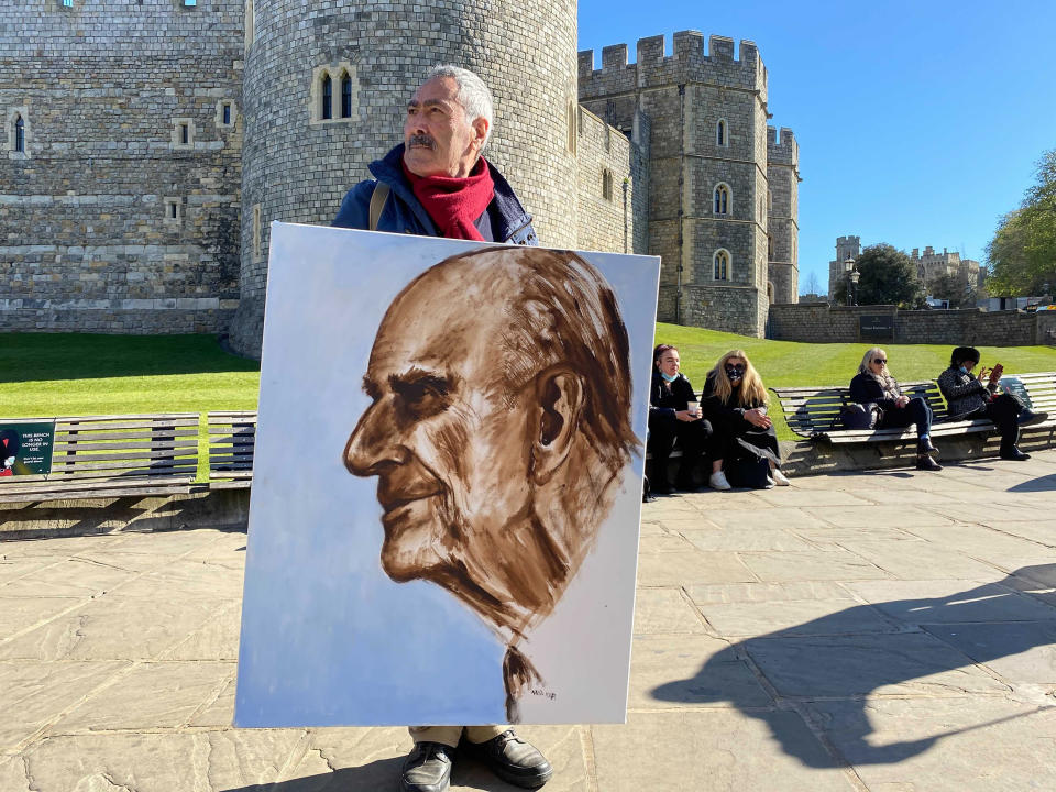 Image: Kaya Mar, a political cartoonist, in Windsor for Prince Philip's funeral. (Adela Suliman / NBC News)