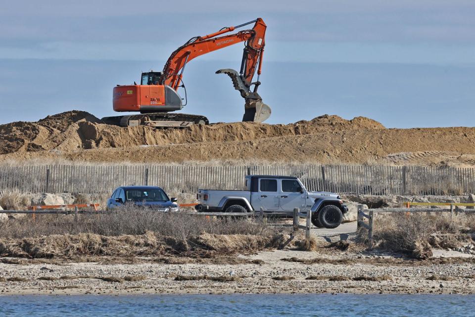 Beach build-up work continues to renovate and reclaim Duxbury Beach area that are subject to storm erosion on Thursday, Feb. 22, 2024. Thousands of yards of sand are being used to raise the level of the barrier beach.