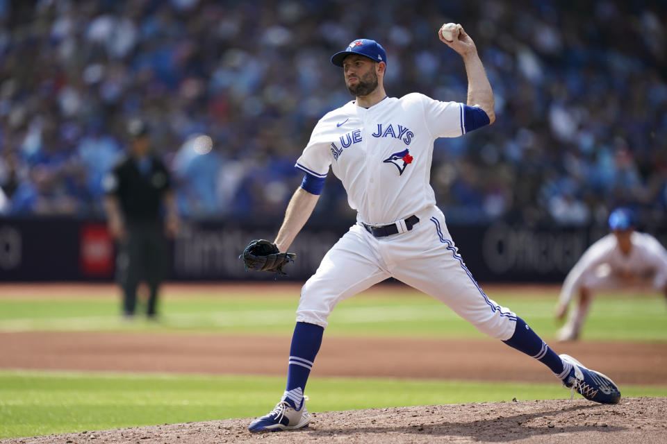 Toronto Blue Jays relief pitcher Tim Mayza (58) throws against the Minnesota Twins during the fourth inning of a baseball game in Toronto, Saturday, June 10, 2023. (Arlyn McAdorey/The Canadian Press via AP)