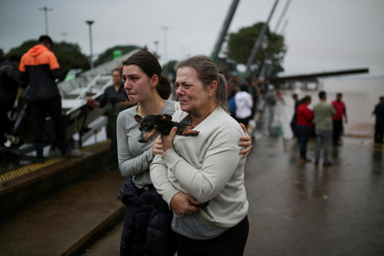 People react after being rescued from flood in Porto Alegre, in Rio Grande do Sul, Brazil, May 4, 2024. / Credit: Renan Mattos/REUTERS