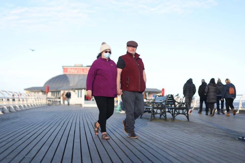 People walking on Cromer Pier in North Norfolk (James Manning/PA) (PA Wire)
