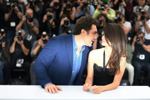 Spanish husband and wife acting duo Javier Bardem and Penelope Cruz share a moment at the Cannes Film Festival