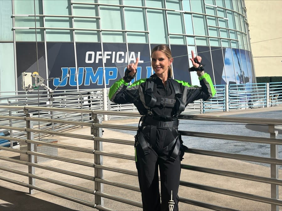 CBS’S Natalie Morales dived nearly 830 feet Friday from Sky Jump Las Vegas at The STRAT. The thrilling morning was filmed for a promotional shoot to air Feb. 5. (Lauren Negrete / KLAS)